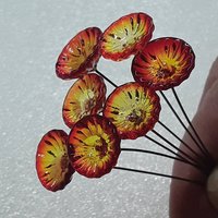 FIRE CORAL DISK glass flower headpins  ~ tiny, small, miniature glass flowers on wire; individually crafted lampwork  uv reactive glow