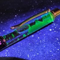 Alien Spit Slime Goo Ink Pen -proof that aliens do exist! UV glow, uranium glow radioactive, slime filled ink pen with cosmic design LIMITED