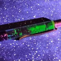Alien Spit Slime Goo Ink Pen -proof that aliens do exist! UV glow, uranium glow radioactive, slime filled ink pen with cosmic design LIMITED