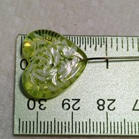 Uranium vasoline glass heart plant pick with white swirls on 5in wire. Use for floral bouquet, plants, jewelry, gifts; handmade by me; 395nm