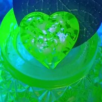 My Heart Glows! Uranium Small Heart  3/4in, vasoline glass with white swirls. lampwork pocket heart, cabachon, wire wrapping, jewelry, curio