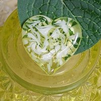 My Heart Glows! Uranium Small Heart  3/4in, vasoline glass with white swirls. lampwork pocket heart, cabachon, wire wrapping, jewelry, curio