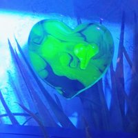 My Green Heart Glows! Uranium Large Heart 1.125" (25mm) sage green glass with uranium swirls; this pocket heart is perfect for gift or curio