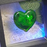 My Green Heart Glows! Uranium Large Heart 1.125" (25mm) sage green glass with uranium swirls; this pocket heart is perfect for gift or curio