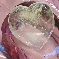 My Wispy Heart Glows! Uranium Large Heart  1" (25mm) clear glass with uranium swirls; This pocket heart is perfect for gift or curio display