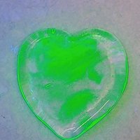 My Wispy Heart Glows! Uranium Large Heart  1" (25mm) clear glass with uranium swirls; This pocket heart is perfect for gift or curio display
