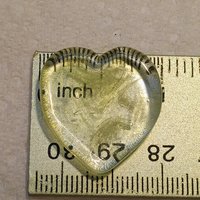 My Wispy Heart Glows! Uranium Large Heart  1" (25mm) clear glass with uranium swirls; This pocket heart is perfect for gift or curio display