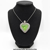 My Heart Glows! Uranium Small Heart  3/4in, vasoline glass with white swirls. lampwork pocket heart, cabachon, wire wrapping, jewelry, curio