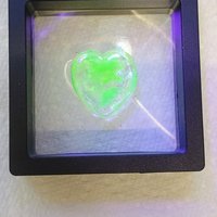 My Wispy Heart Glows! Uranium Large Heart  1" (25mm) clear glass with uranium swirls; This pocket heart is perfect for gift or curio display