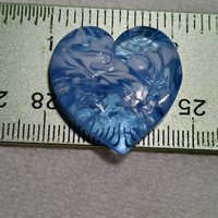 Glass Heart UV Blue Glow in 395uv; Large Heart 1.1/16" (31mm) blue glow glass with white swirls; wirewrapping, jewelry, pocket heart, gift