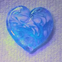 Glass Heart UV Blue Glow in 395uv; Large Heart 1.1/16" (31mm) blue glow glass with white swirls; wirewrapping, jewelry, pocket heart, gift