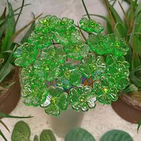 Uranium Glass 4 leaf Clover Shamrock, Luck of the Irish, green sprinkle frit; lampwork plant pick on 5in wire. Bouquet, Irish gift, 395nm
