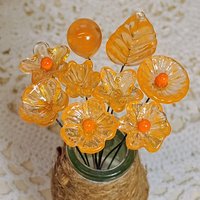 Tangerine glass flowers on wire headpins; juicy mix of clear and orange. Handcraft lampwork: jewelry, gifts, wedding, bouquets, mixed media