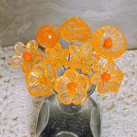 Tangerine glass flowers on wire headpins; juicy mix of clear and orange. Handcraft lampwork: jewelry, gifts, wedding, bouquets, mixed media