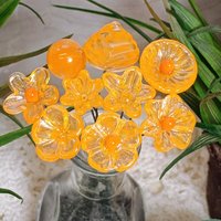 Tangerine glass flowers on wire headpins; juicy mix of clear and orange. Handcraft lampwork: jewelry, gifts, wedding, bouquets, mixed media