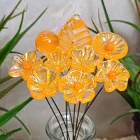 Tangerine glass flowers on wire headpins; juicy mix of clear and orange. Handcraft lampwork: jewelry, gifts, wedding, bouquets, mixed media