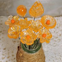 Tangerine glass flowers on wire headpins; juicy mix of clear and orange. Handcraft lampwork: jewelry, gifts, wedding, bouquets, mixed media