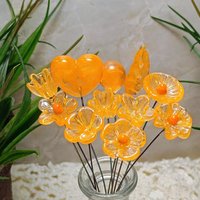 Tangerine glass flowers on wire headpins; juicy mix of clear and orange. Handcraft lampwork: jewelry, gifts, wedding, bouquets, mixed media