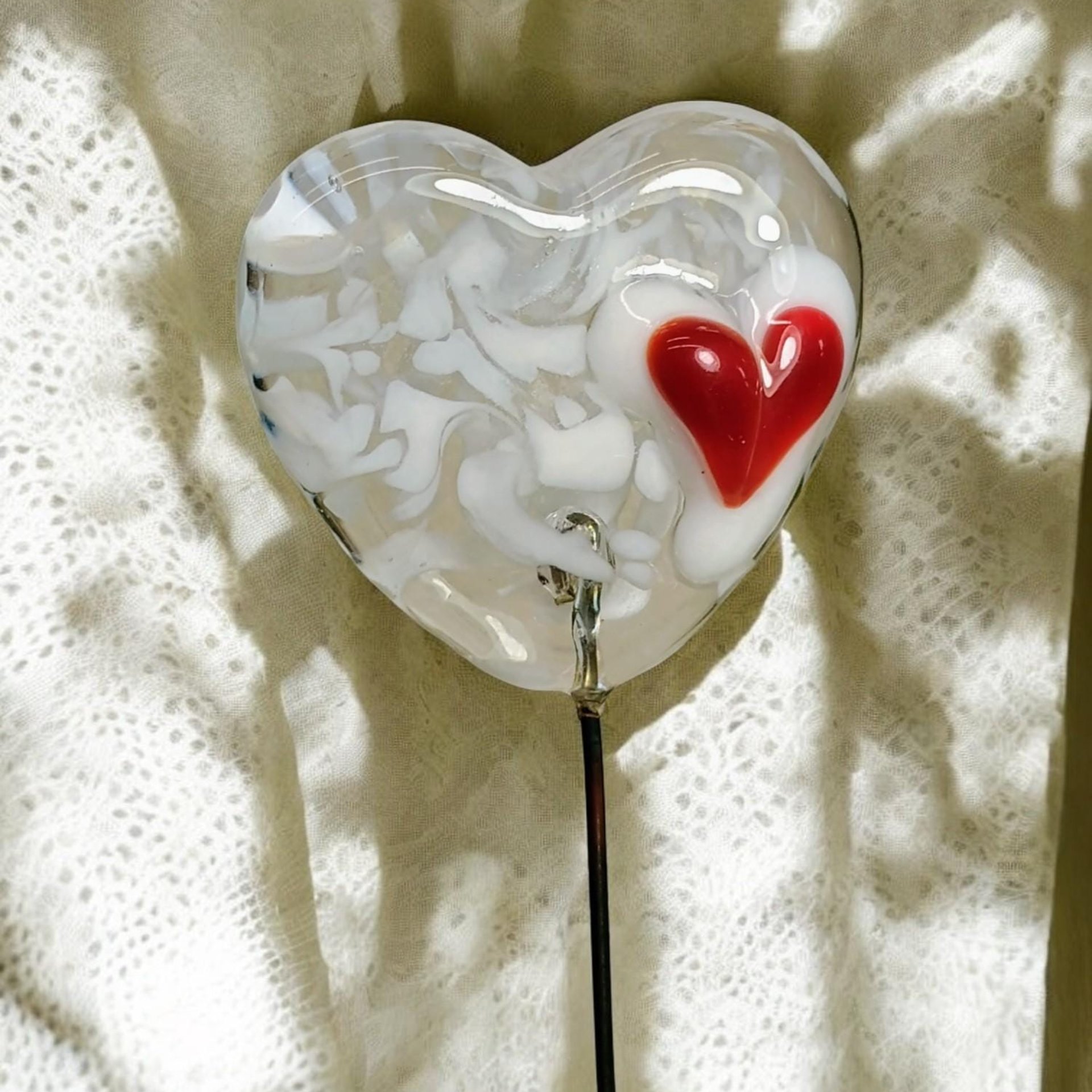 Glass Heart: White Swirl w/Red Heart, Heart on 5in wire. Use for floral bouquet, plants, jewelry, gifts; each unique Measures 3/4in x 3/4in