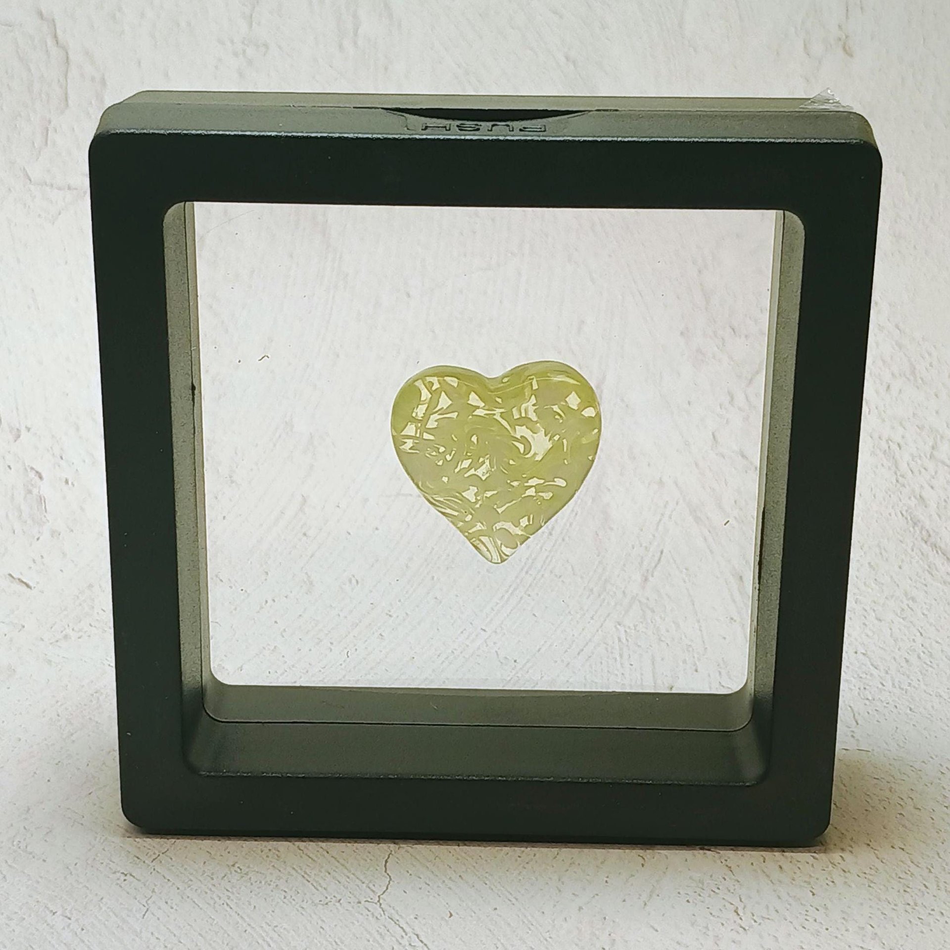 My Heart Glows! Uranium Small Heart  3/4in, vasoline glass with white swirls. lampwork pocket heart, cabachon, wire wrapping, jewelry, curio