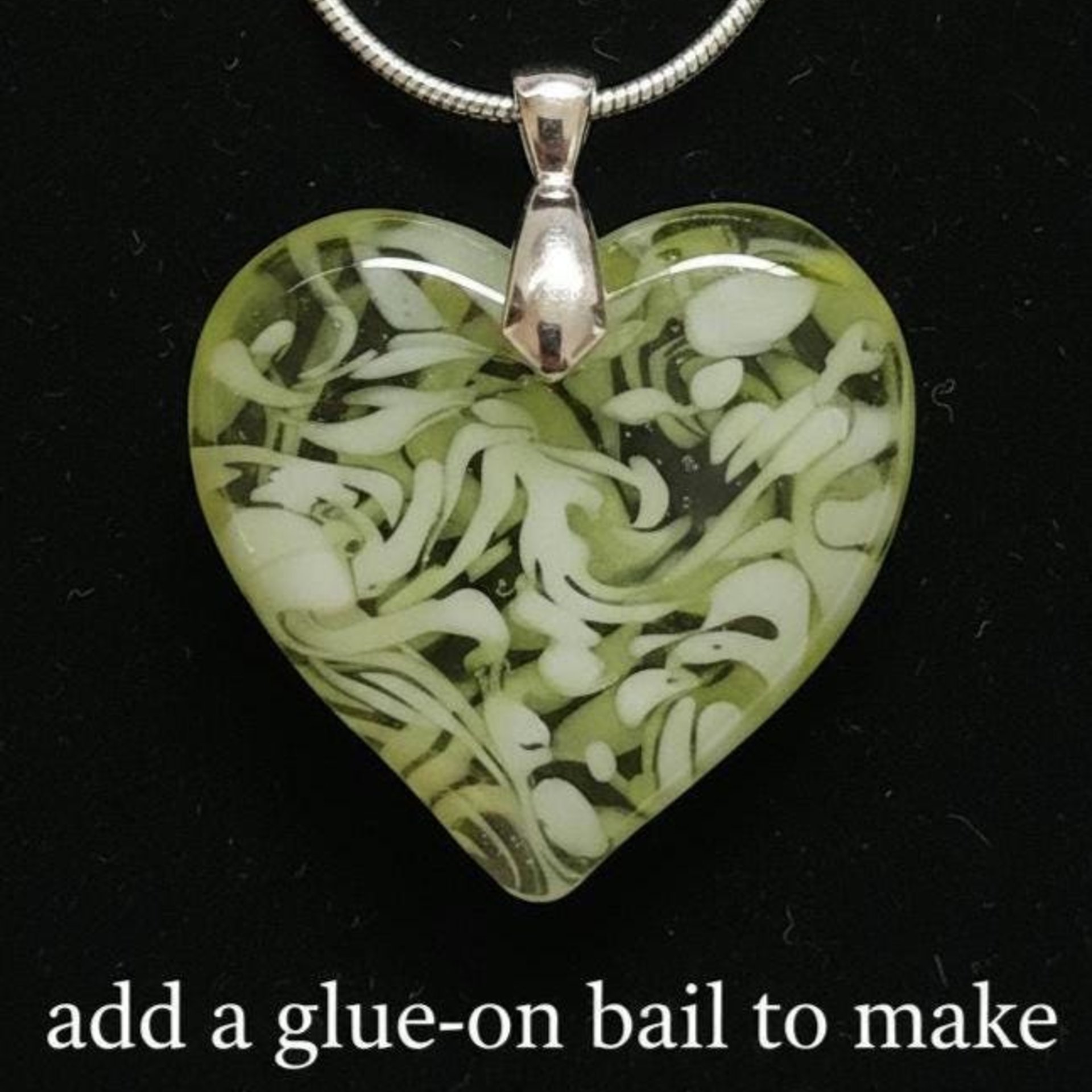 My Heart Glows! Uranium Small Heart  3/4in, vasoline glass with white swirls. lampwork pocket heart, cabachon, wire wrapping, jewelry, curio