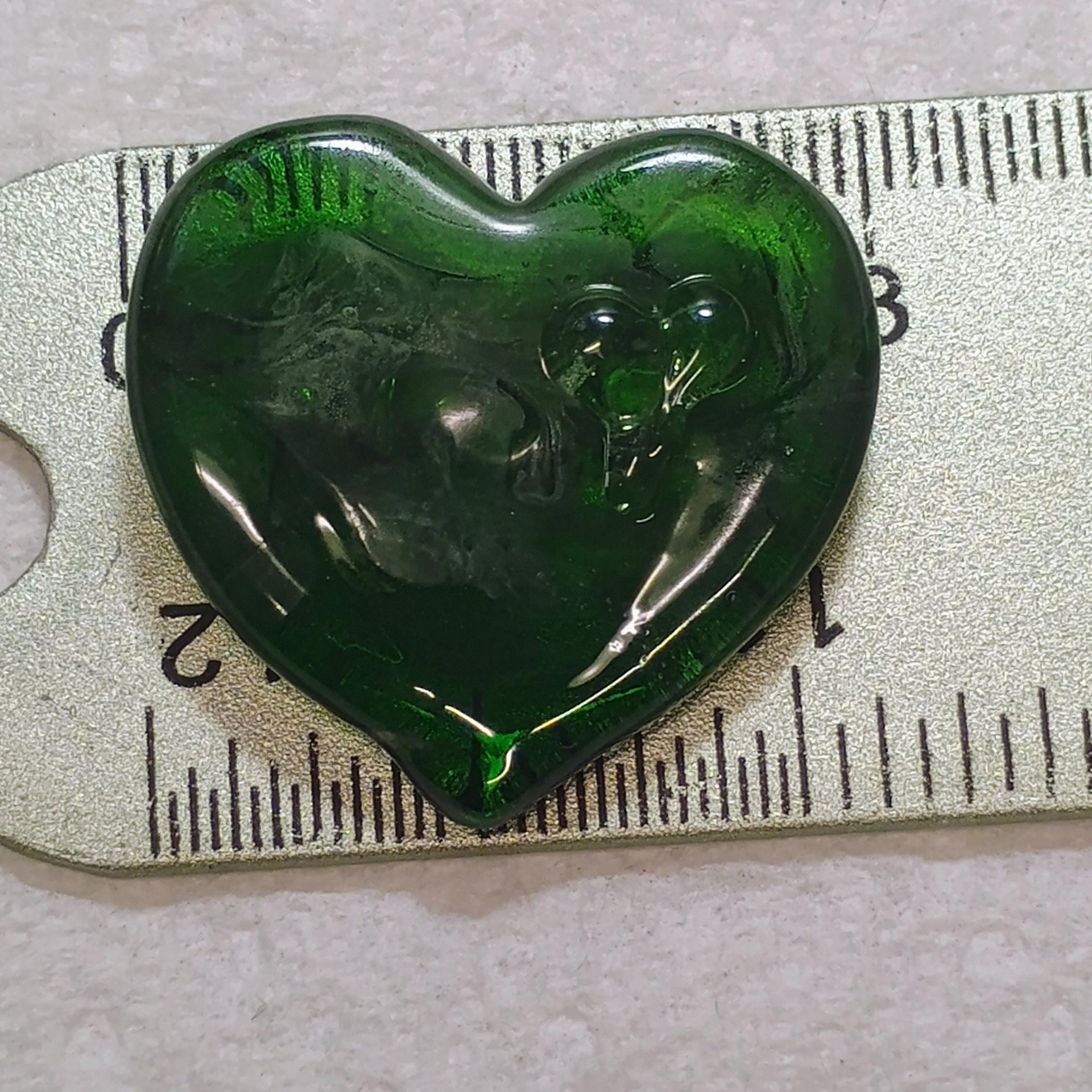 My Green Heart Glows! Uranium Large Heart 1.125" (25mm) sage green glass with uranium swirls; this pocket heart is perfect for gift or curio