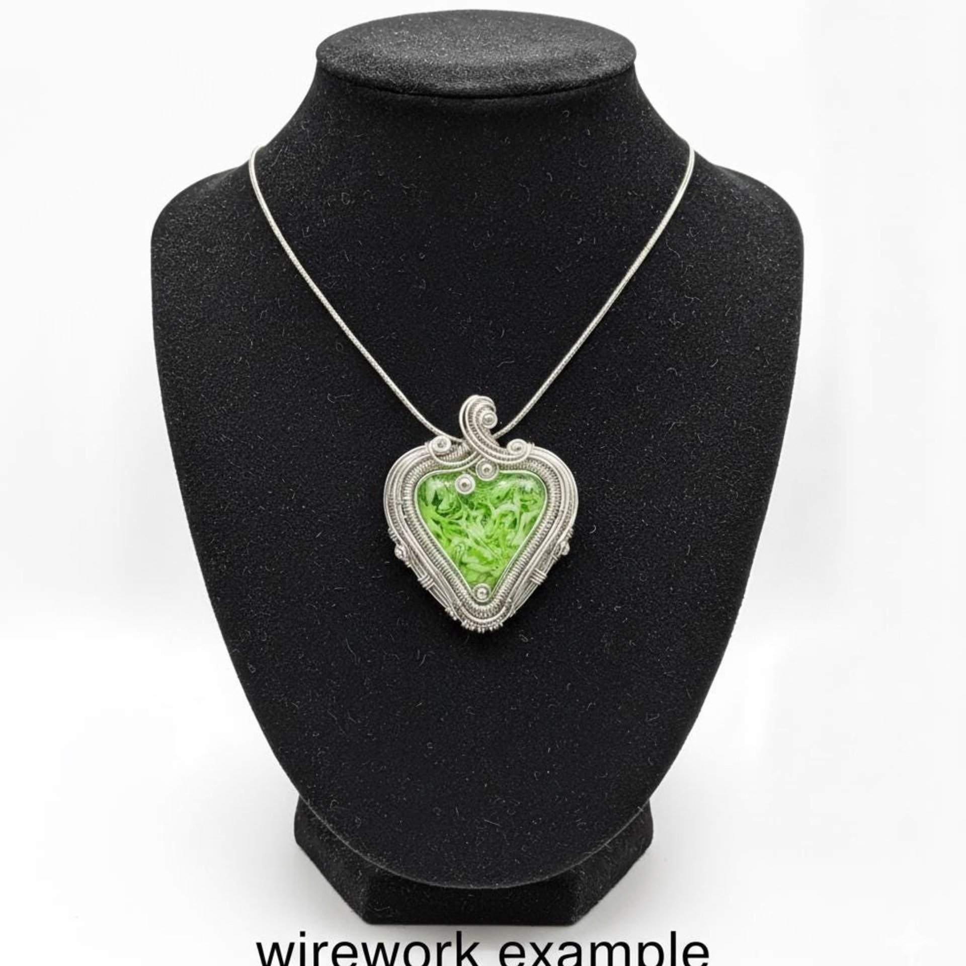 My Heart Glows! Uranium Small Heart  3/4in, vasoline glass with white swirls. lampwork pocket heart, cabachon, wire wrapping, jewelry, curio