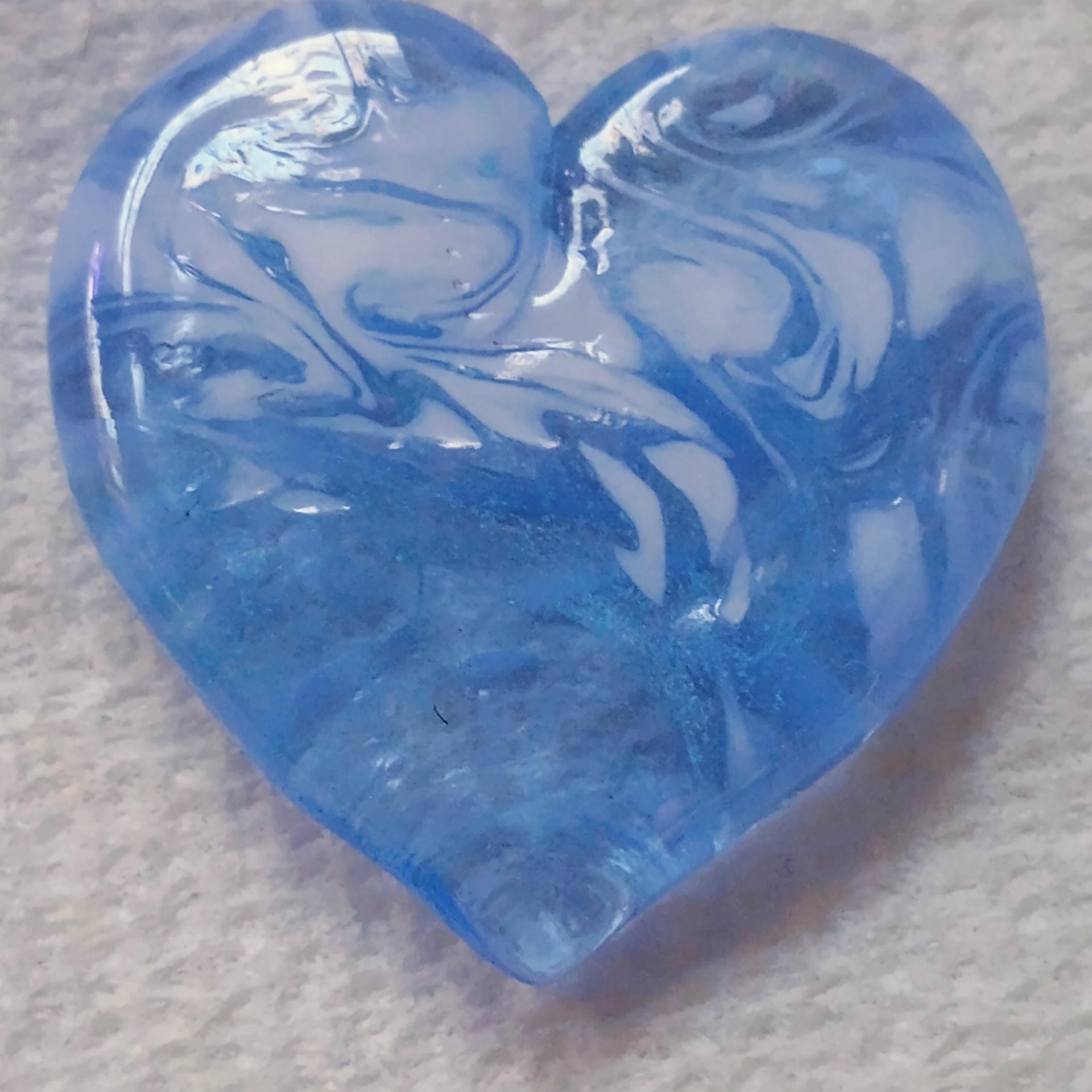 Glass Heart UV Blue Glow in 395uv; Large Heart 1.1/16" (31mm) blue glow glass with white swirls; wirewrapping, jewelry, pocket heart, gift