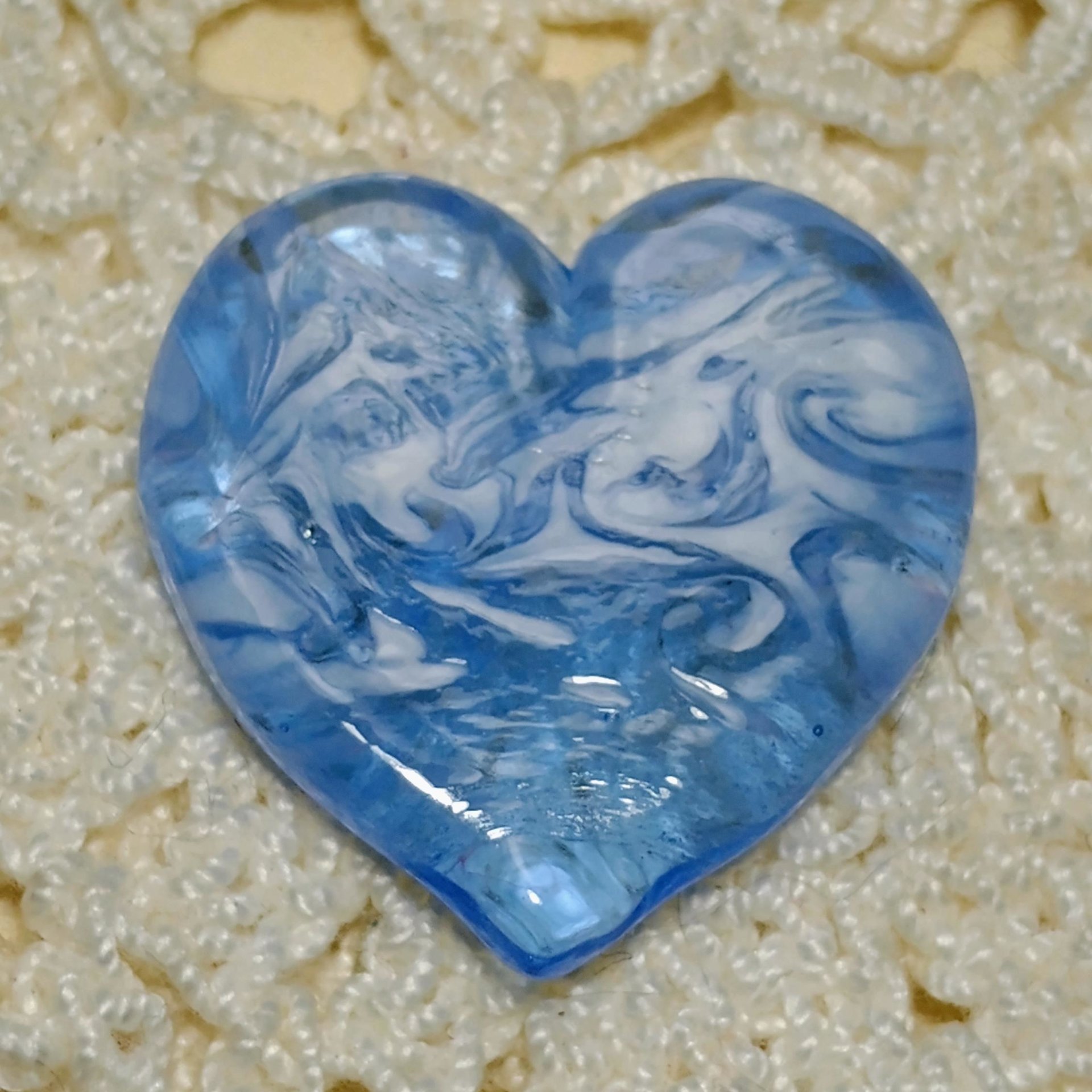 Glass Heart UV Blue Glow in 395uv; Large Heart 1.1/16" (31mm) blue glow glass with white swirls; wirewrapping, jewelry, pocket heart, gift