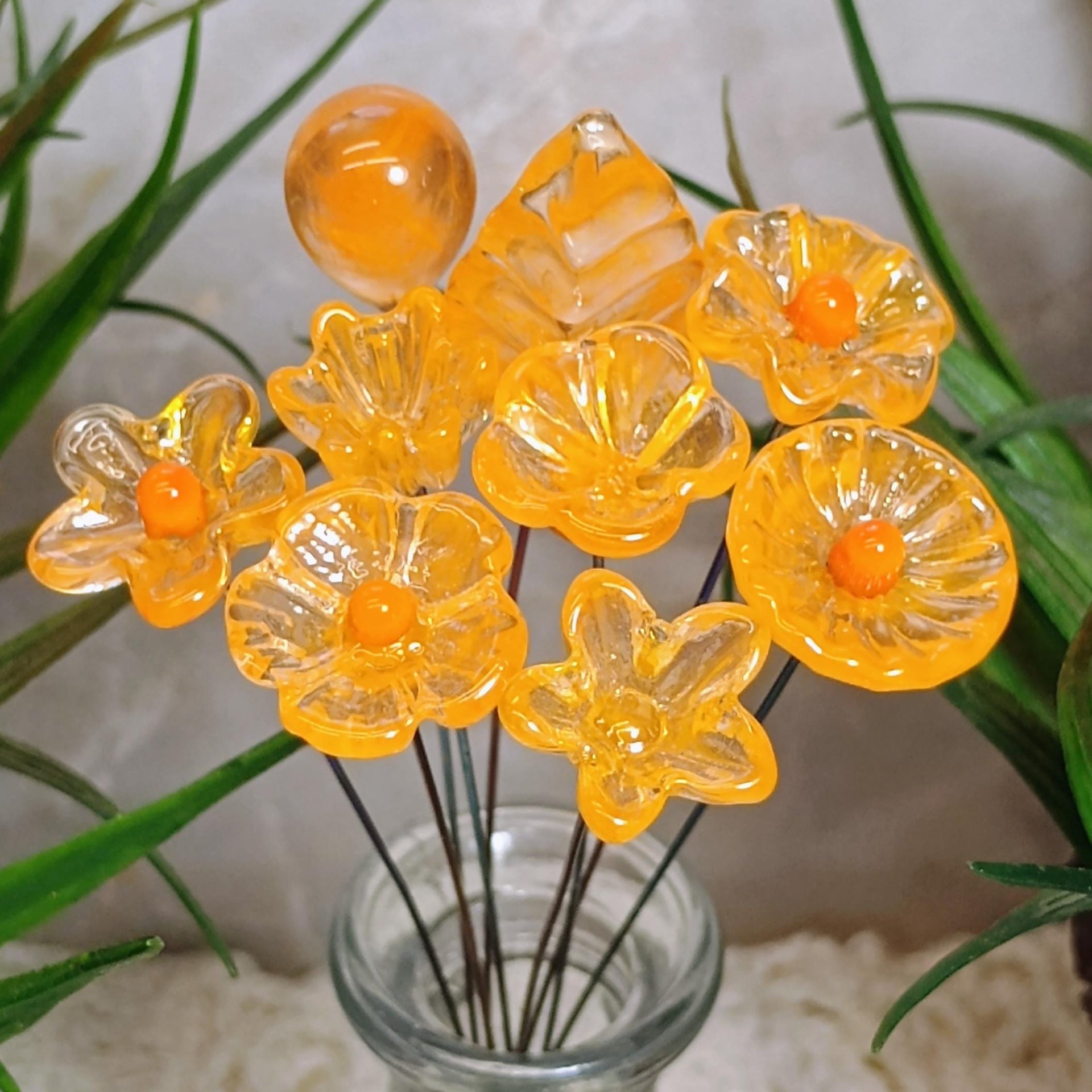Tangerine glass flowers on wire headpins; juicy mix of clear and orange. Handcraft lampwork: jewelry, gifts, wedding, bouquets, mixed media