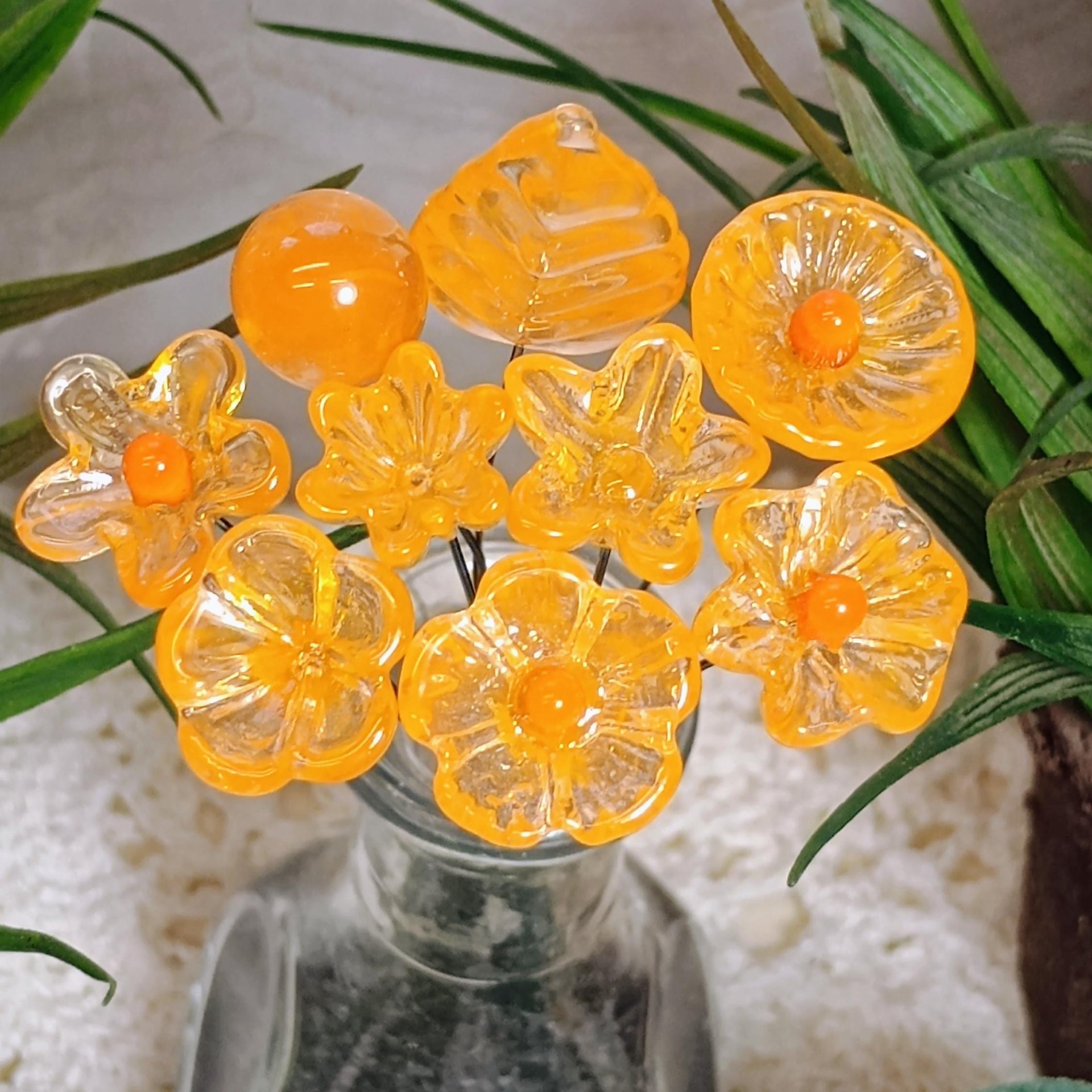 Tangerine glass flowers on wire headpins; juicy mix of clear and orange. Handcraft lampwork: jewelry, gifts, wedding, bouquets, mixed media