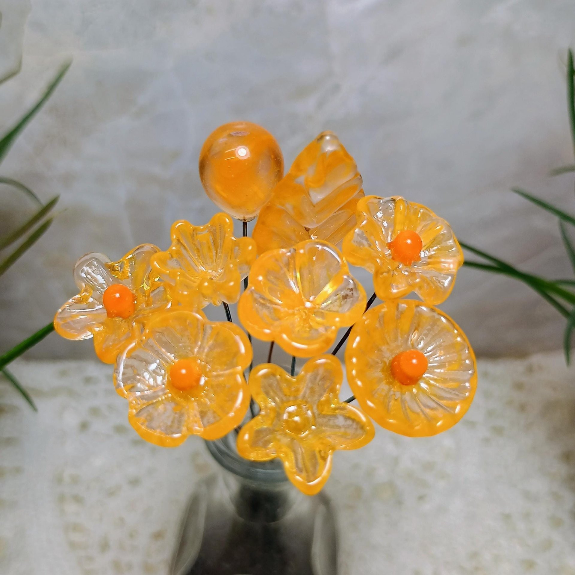 Tangerine glass flowers on wire headpins; juicy mix of clear and orange. Handcraft lampwork: jewelry, gifts, wedding, bouquets, mixed media