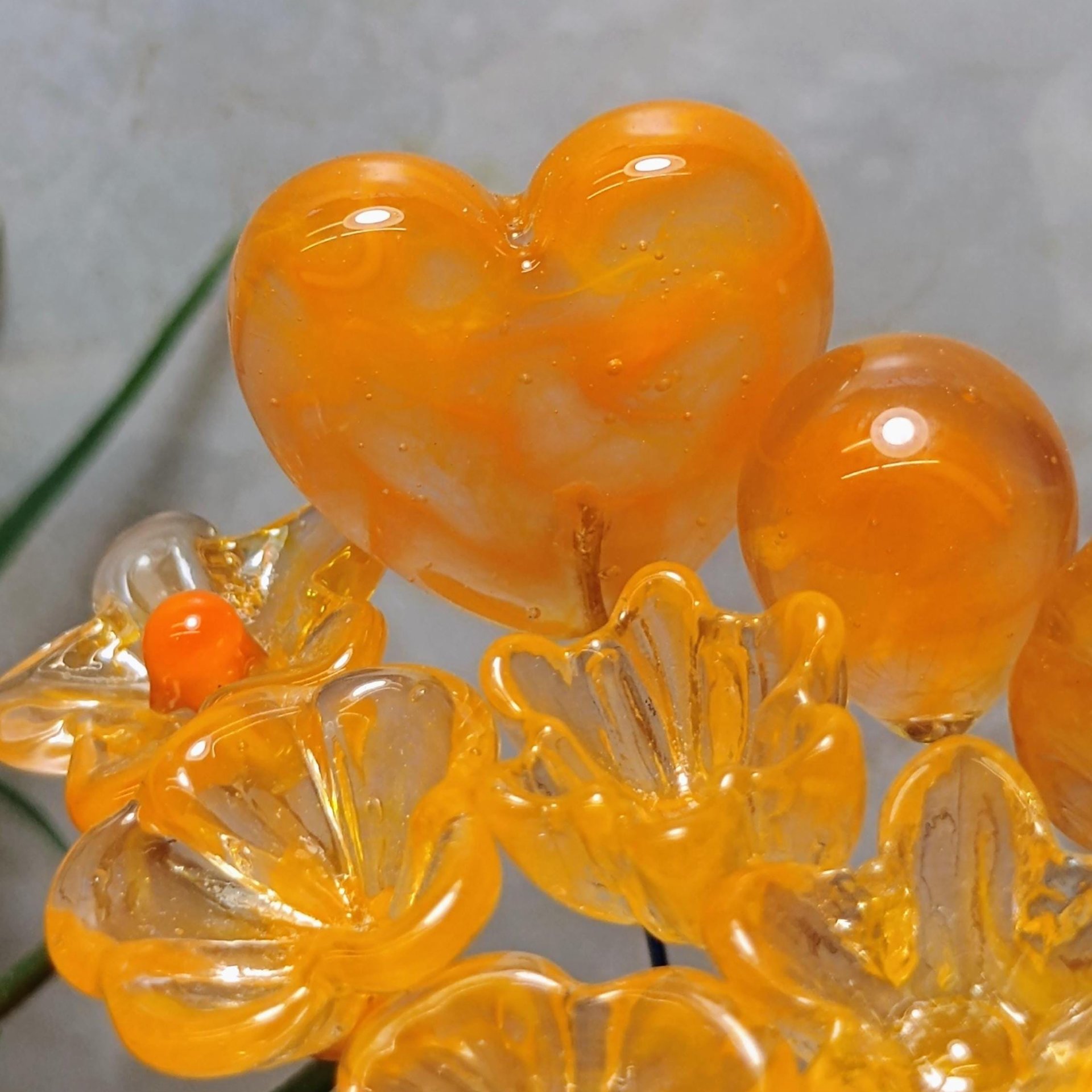 Tangerine glass flowers on wire headpins; juicy mix of clear and orange. Handcraft lampwork: jewelry, gifts, wedding, bouquets, mixed media