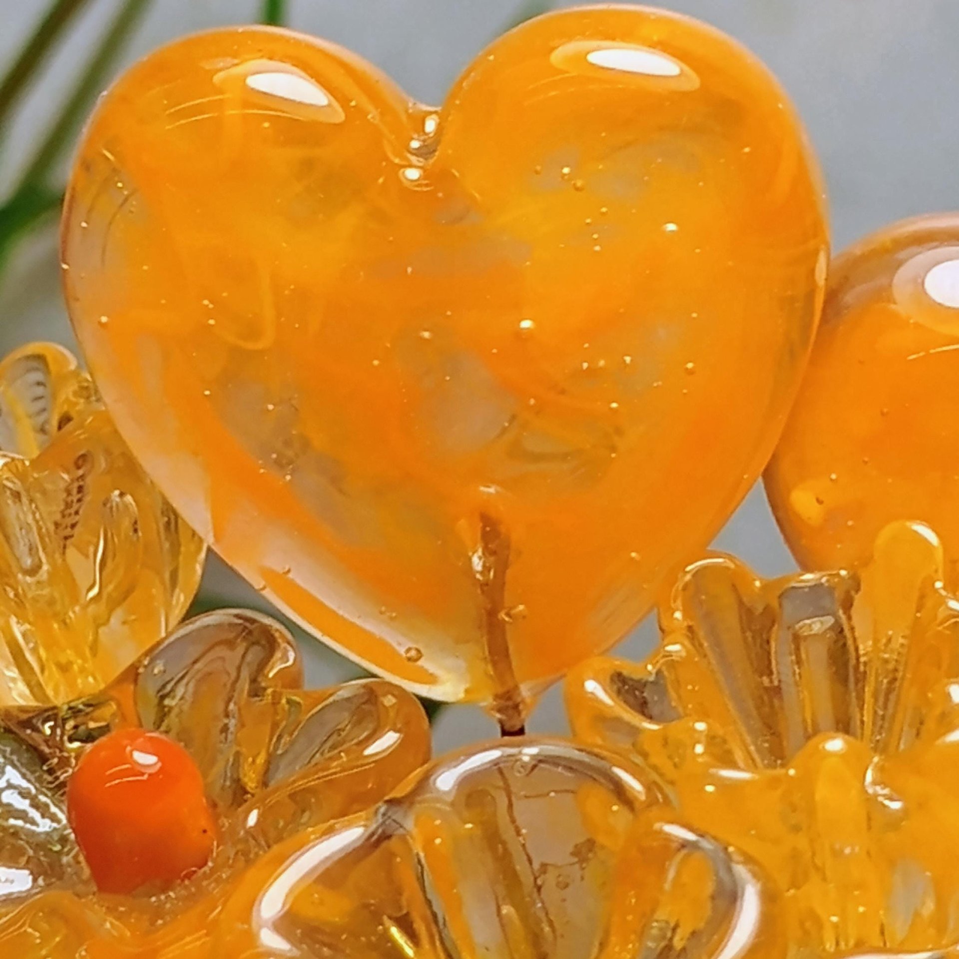 Tangerine glass flowers on wire headpins; juicy mix of clear and orange. Handcraft lampwork: jewelry, gifts, wedding, bouquets, mixed media