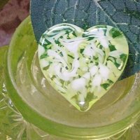 My Heart Glows! Uranium Small Heart  3/4in, vasoline glass with white swirls. lampwork pocket heart, cabachon, wire wrapping, jewelry, curio