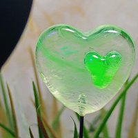 Wispy uranium vasoline glass on clear heart plant pick on 5in wire. Use for floral bouquet, plants, jewelry, gifts; handmade; 395nm