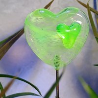 Wispy uranium vasoline glass on clear heart plant pick on 5in wire. Use for floral bouquet, plants, jewelry, gifts; handmade; 395nm