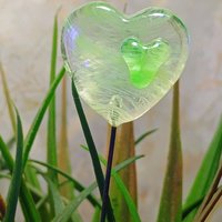 Wispy uranium vasoline glass on clear heart plant pick on 5in wire. Use for floral bouquet, plants, jewelry, gifts; handmade; 395nm