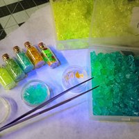 Uranium UV Glass Chips in Larger 1.75" Bottle Jar; Uranium, Green, Blue, Yellow, Amberina; curio, jewelry, mixed media, UV GLOW 365nm 395nm