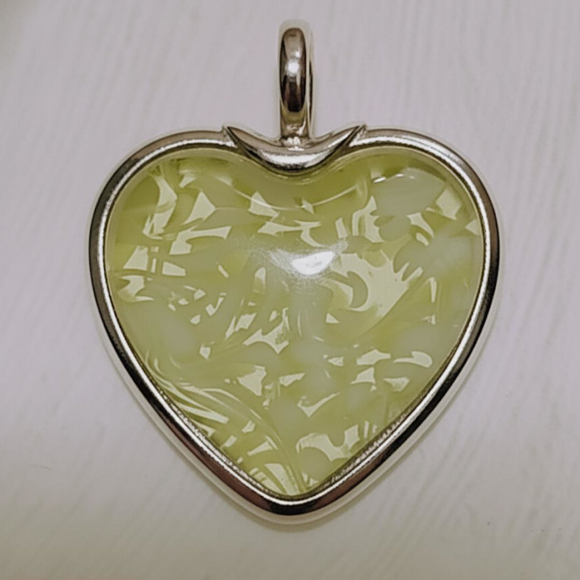 My Heart Glows! Uranium Large Heart 1.25" (30mm) vasoline glass with white victorian-lace swirls; wirewrapping, jewelry, pocket heart, gift,