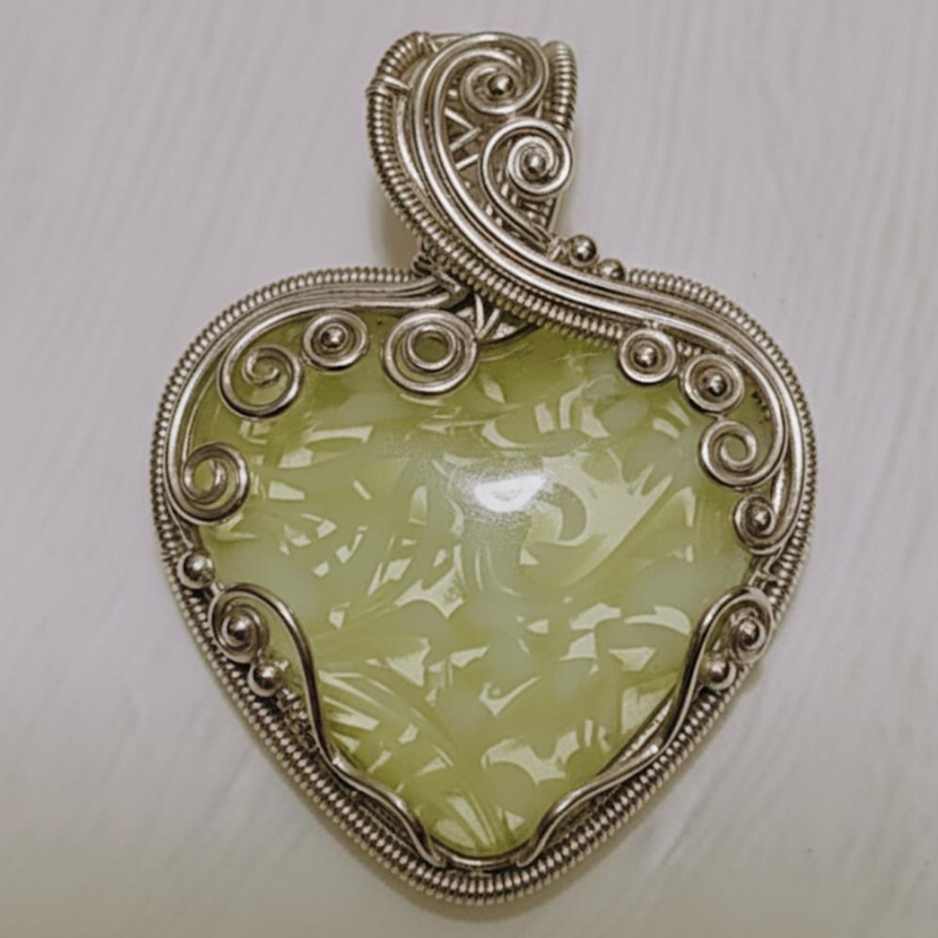 My Heart Glows! Uranium Large Heart 1.25" (30mm) vasoline glass with white victorian-lace swirls; wirewrapping, jewelry, pocket heart, gift,