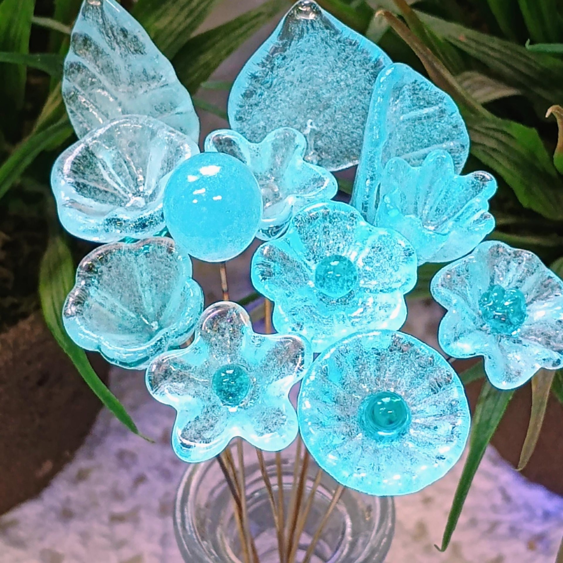 New! SOFT AQUA GLOW uv reactive glass flowers; miniature tiny small glass flowers on wire; handcrafted lampwork; bright aqua glow in 395nm